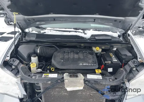 2013 Dodge Grand Caravan Crew z USA, uszkodzony, nr VIN 2C4RDGDG9DR588021